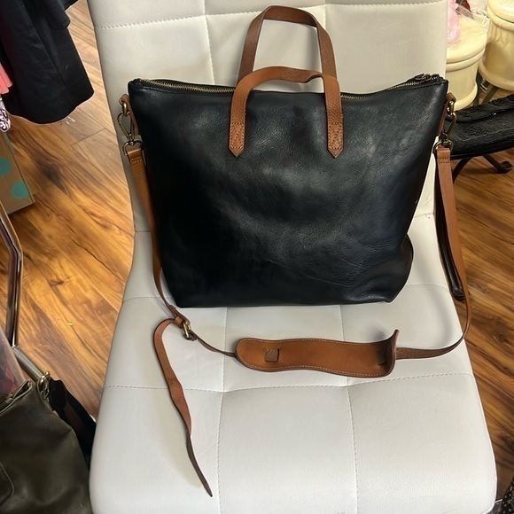 Black and brown leather purse with beautiful hardware